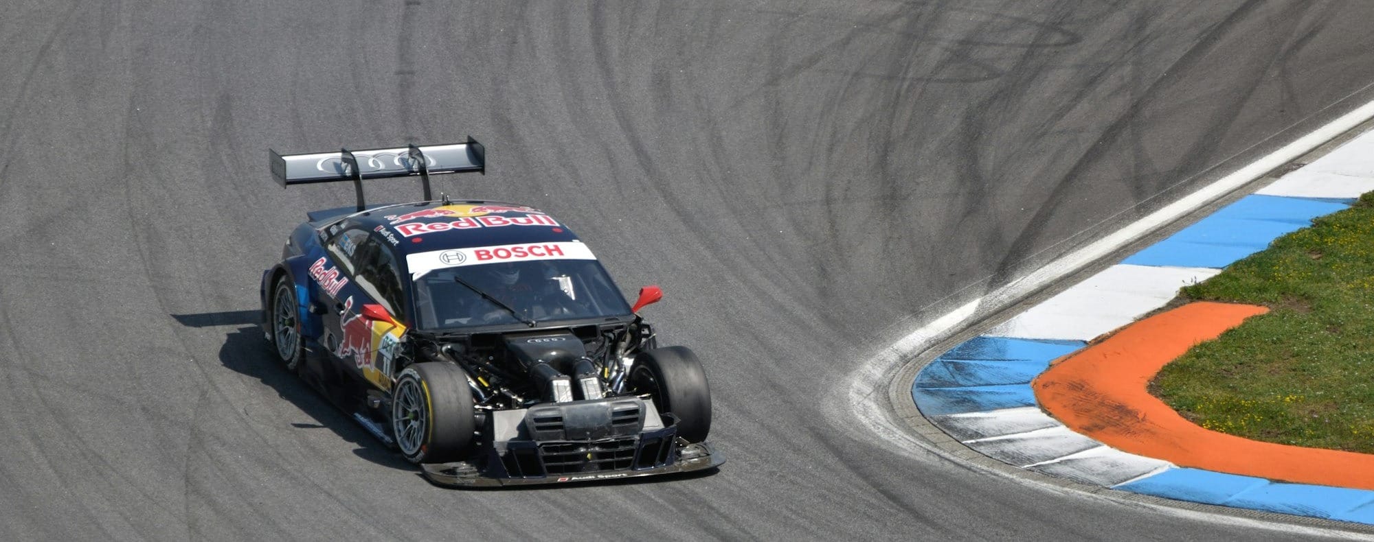 black stock racing car on race track